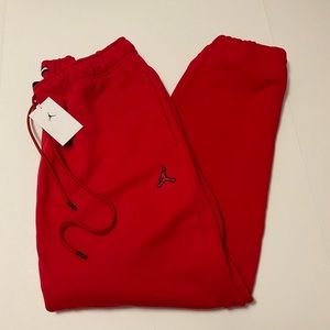 NEW JORDAN RED ESSENTIALS FLEECE PANTS